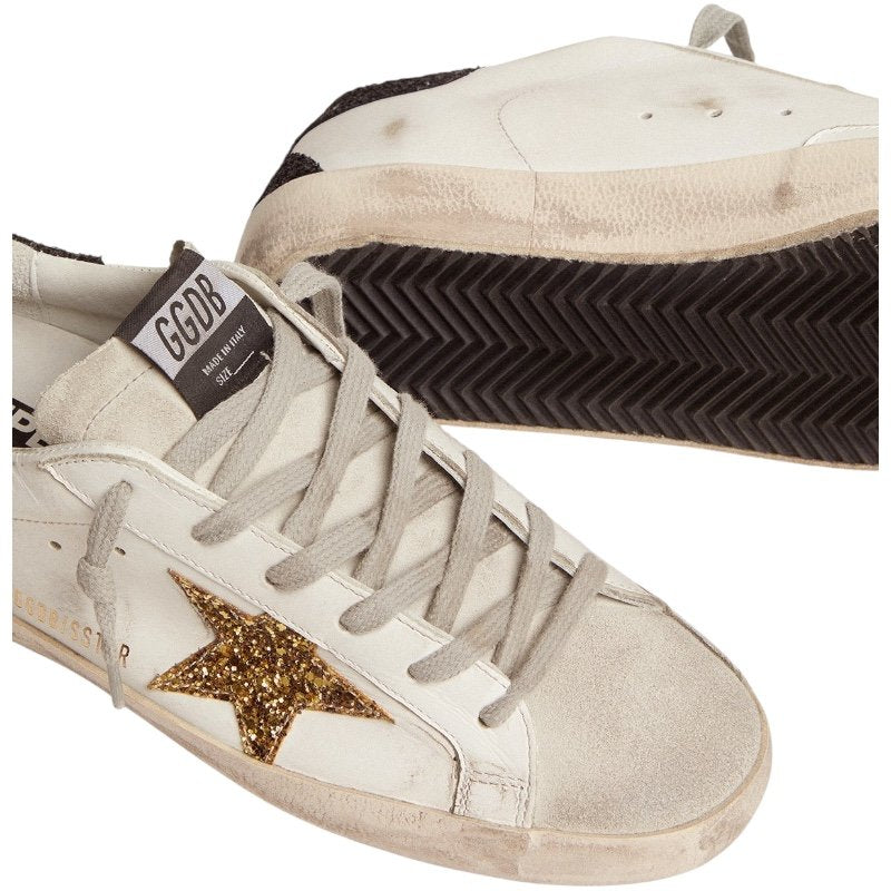 Golden goose Super-Star in nappa leather with gold glitter star and black glitter heel tab