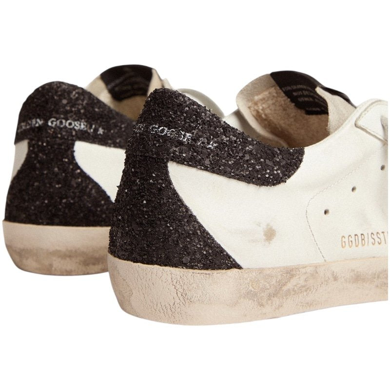 Golden goose Super-Star in nappa leather with gold glitter star and black glitter heel tab